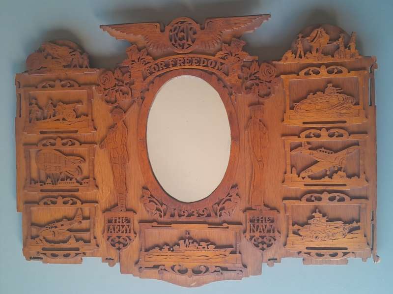 WW2 Hand Carved Oak And Walnut Hanging Mirror Wall Display. Dated 1939. 67 x 50 cm.