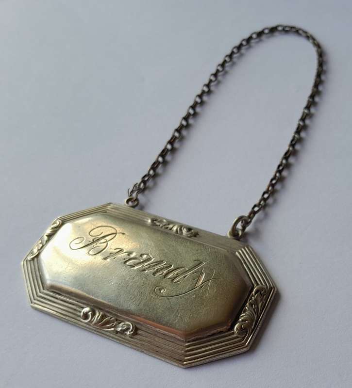 Vintage `Brandy` Decanter Label. Stamped `D&A`.