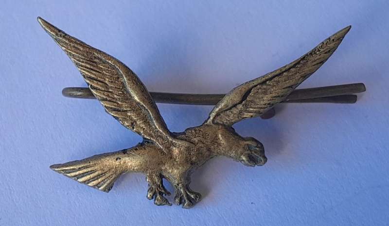 "Reserved". Unidentified Eagle Badge.  WW2?  Lugs Intact.