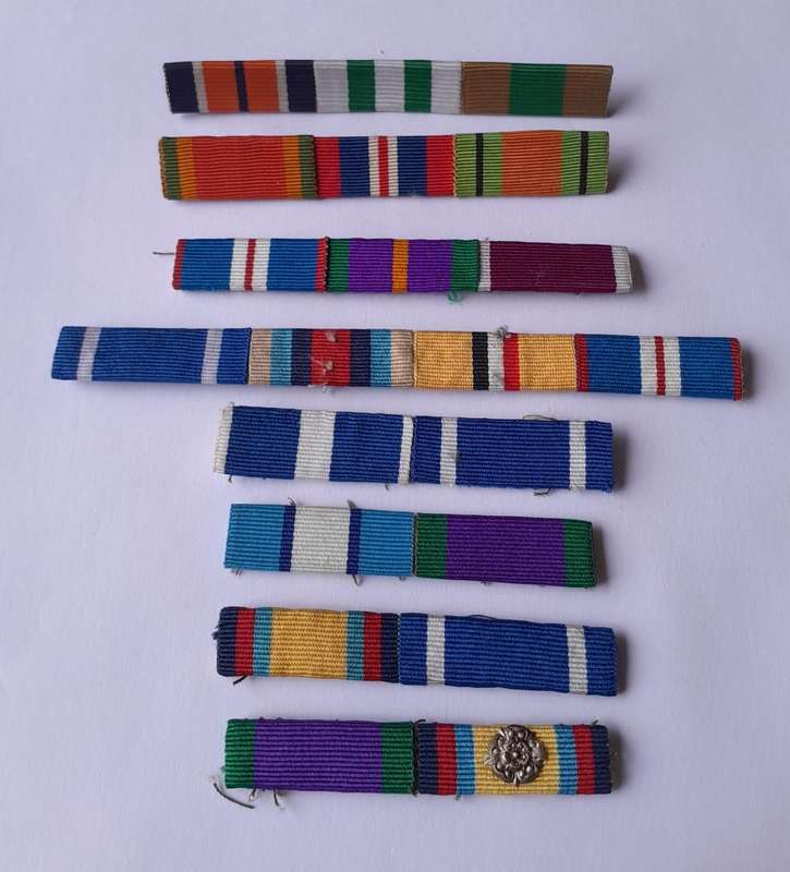 Collection of Medal Bars.  One with Rosette Clasp..