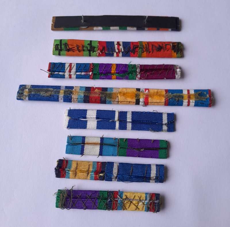Collection of Medal Bars.  One with Rosette Clasp..