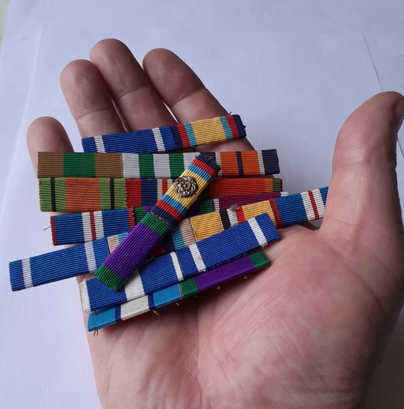 Collection of Medal Bars.  One with Rosette Clasp..