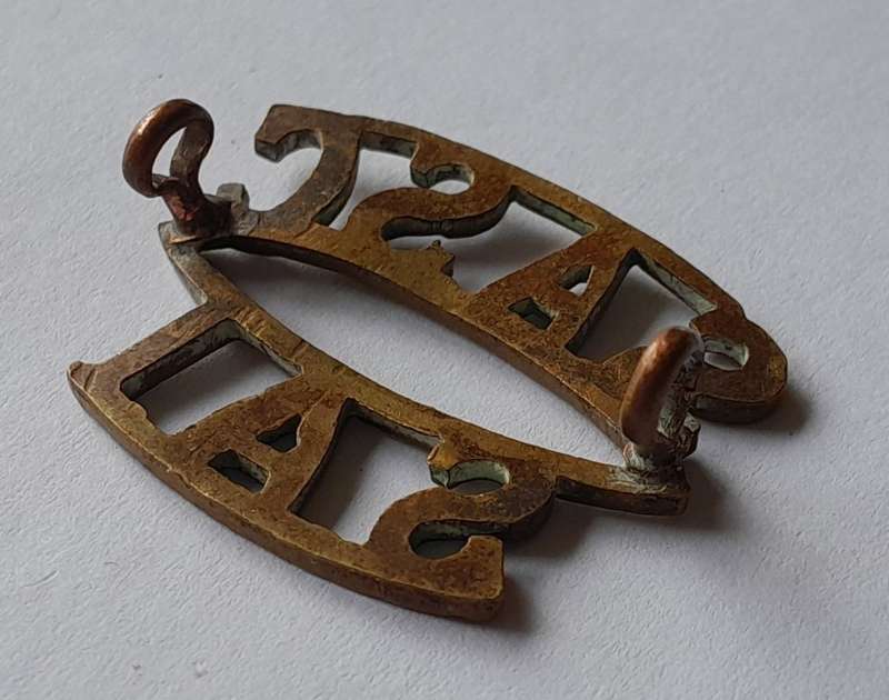 WW2 SA Army Services Corps Shoulder Title.  Lugs Intact.