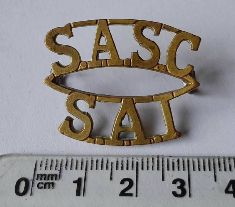 WW2 SA Army Services Corps Shoulder Title.  Lugs Intact.