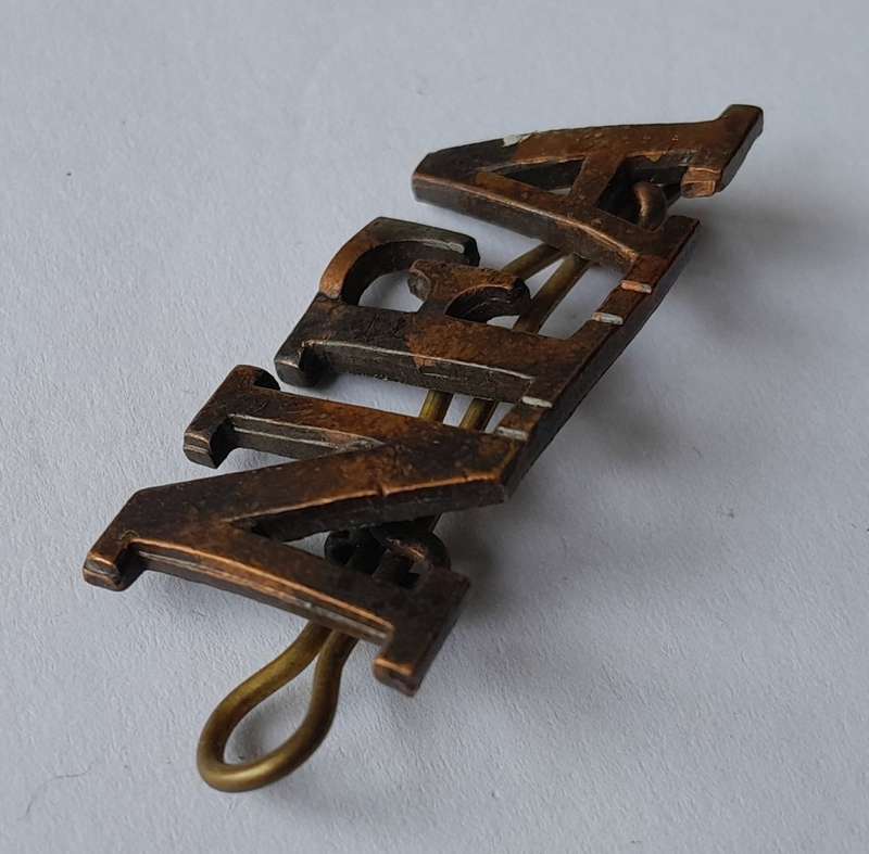 Early Natal Field Artillery Shoulder Title.  Lugs Intact.