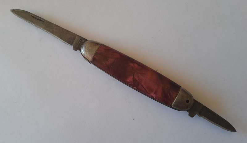 Vintage Czech "Mikov" Folding Knife with Marbled Handle.