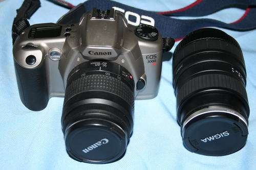 Canon EOS 3000 35mm camera with a Canon 35-80mm zoom lens (with filter)