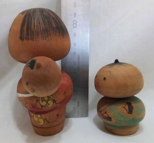 Kokeshi doll family signed by artist