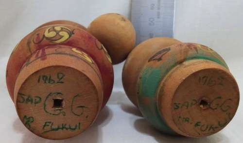 Kokeshi doll family signed by artist