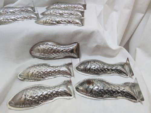 Ten lovely vintage small fish moulds