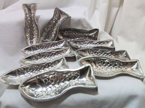 Ten lovely vintage small fish moulds