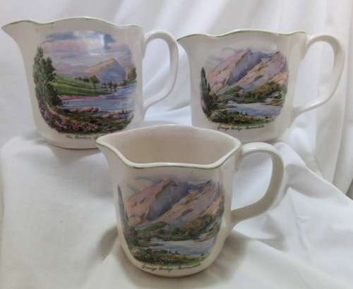Three stunning vintage trio of Nelson ware pitchers