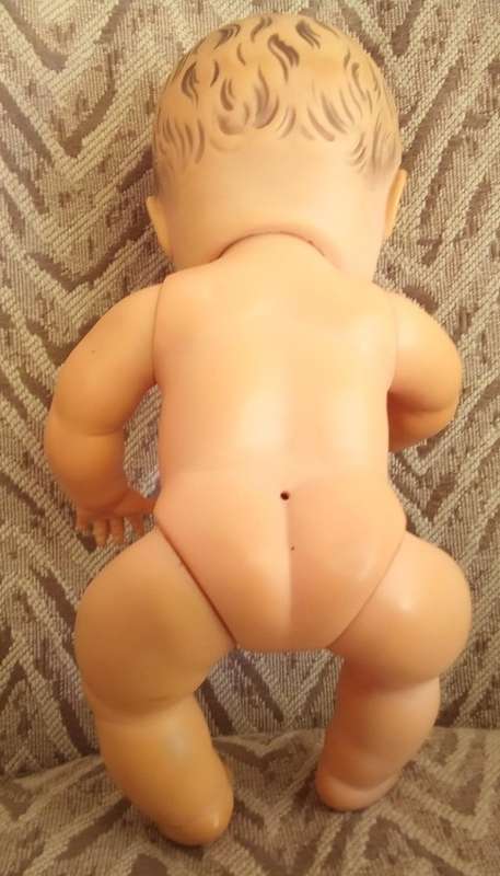 Small vintage soft rubber doll