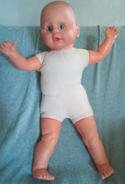 Cute blue eyed 1980s Baby doll