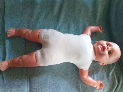 Cute blue eyed 1980s Baby doll