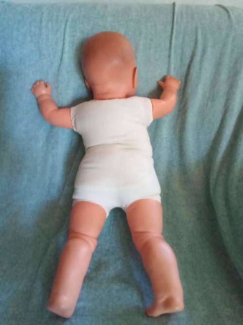Cute blue eyed 1980s Baby doll