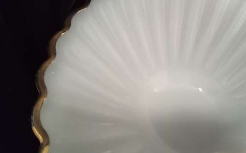 Gorgeous vintage large milk glass bowl with gold trim