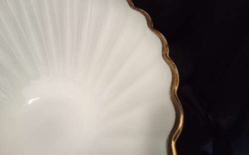 Gorgeous vintage large milk glass bowl with gold trim