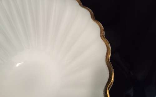 Gorgeous vintage large milk glass bowl with gold trim
