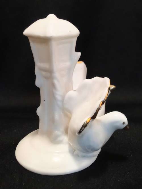 Cute little vintage porcelain figurine with two doves