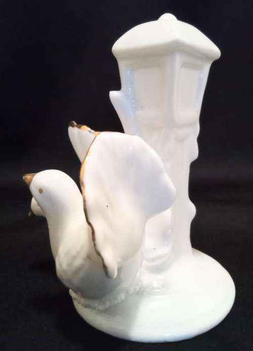 Cute little vintage porcelain figurine with two doves