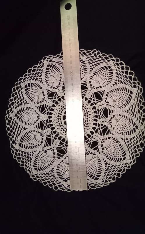 Stunningly detailed vintage hand crocheted doily in excellent condition