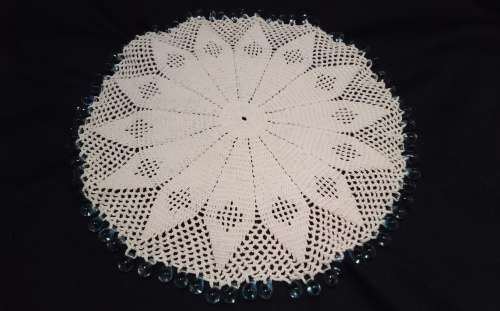 White Vintage crocheted jug cover with turquoise glass beads