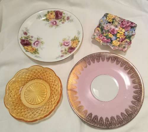 Four Vintage small plates in excellent condition