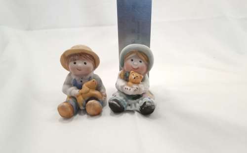 Very cute vintage little boy and girl figurines in excellent condition