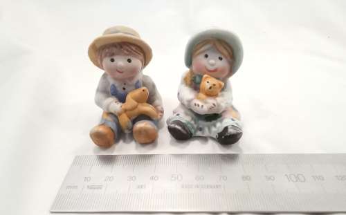 Very cute vintage little boy and girl figurines in excellent condition