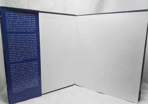 Moments: The Pulitzer Prize Winning Photographs Book by Hal Buell
