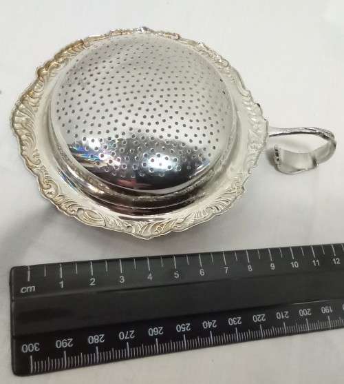 Lovely Chrome plated tea strainer