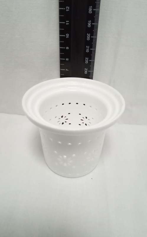 Beautiful fine porcelain tea infuser