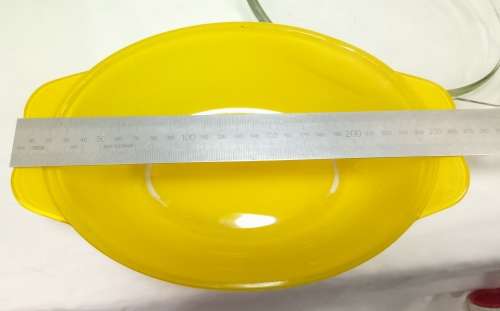 What a find! Vintage Pyrex bright yellow clear glass casserole with lid.