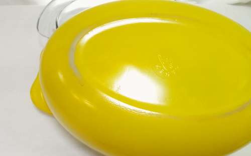 What a find! Vintage Pyrex bright yellow clear glass casserole with lid.