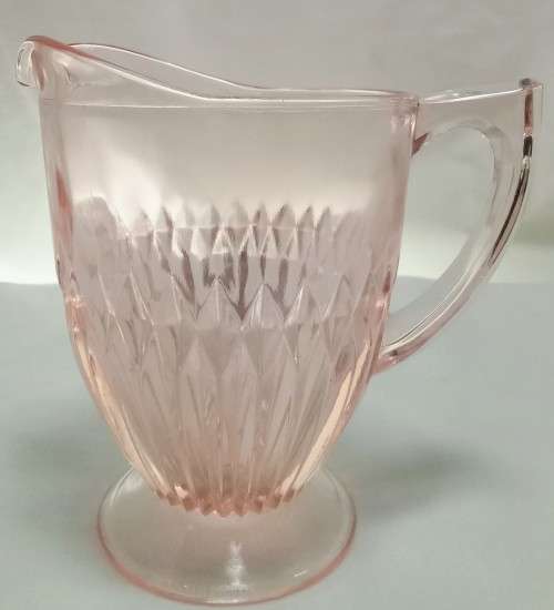 Stunning vintage milk jug in lovely peachy pink glass