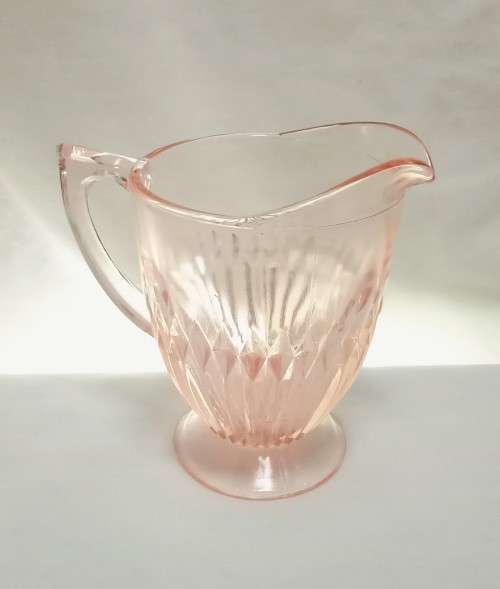 Stunning vintage milk jug in lovely peachy pink glass