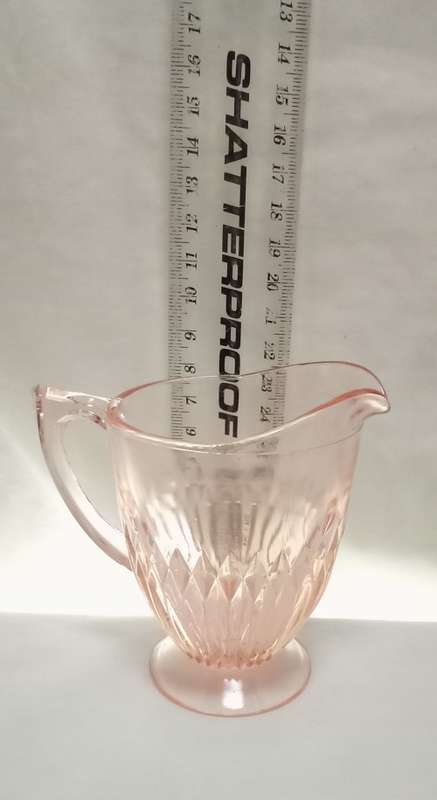 Stunning vintage milk jug in lovely peachy pink glass