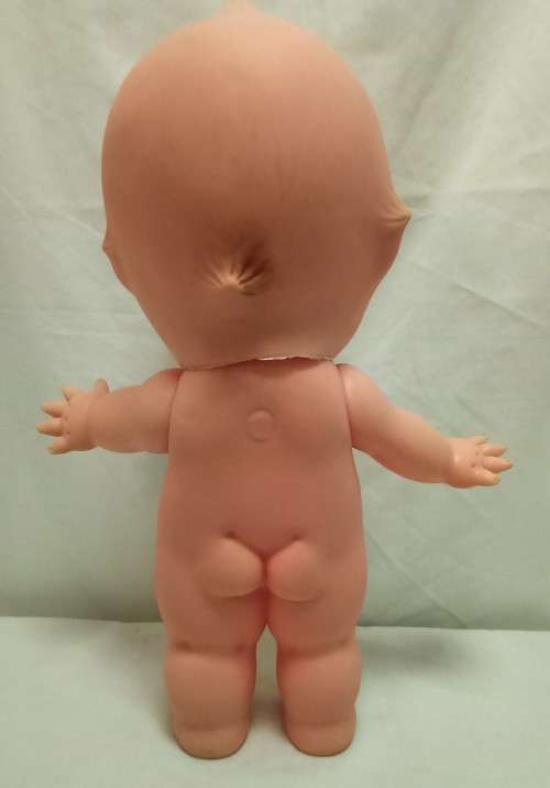 Vintage Kewpie doll with brown eyes