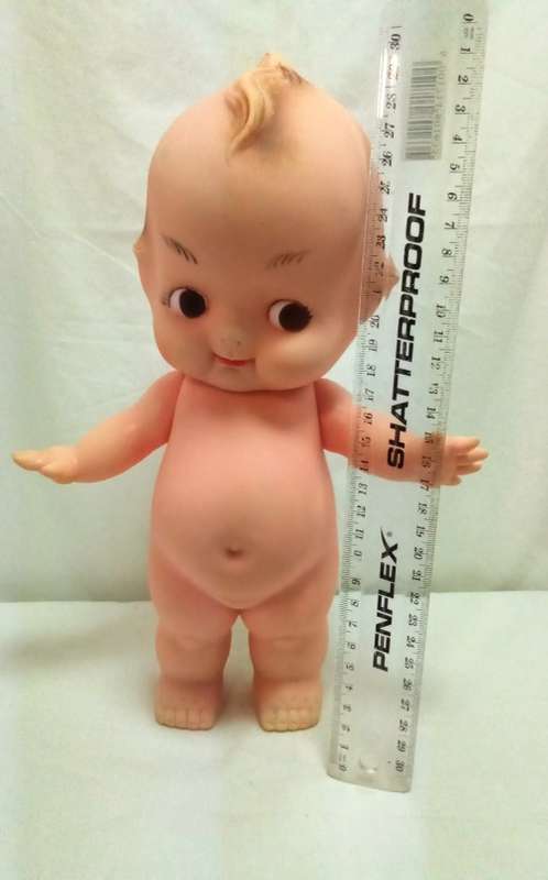 Vintage Kewpie doll with brown eyes