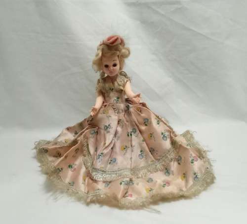 Beautiful vintage "sleepy eye" fashion doll with original dress