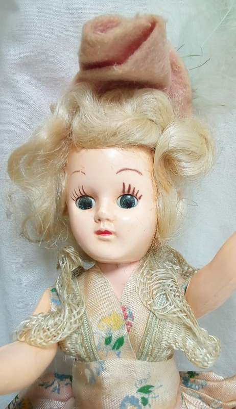Beautiful vintage "sleepy eye" fashion doll with original dress