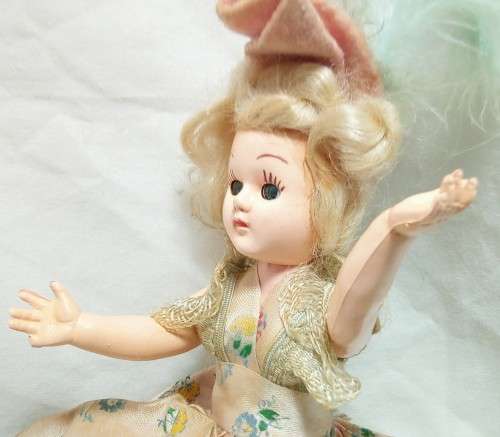 Beautiful vintage "sleepy eye" fashion doll with original dress