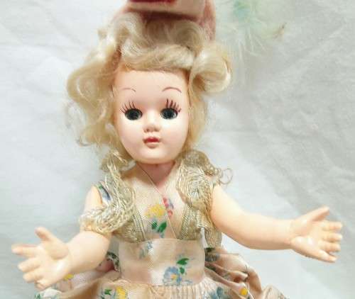 Beautiful vintage "sleepy eye" fashion doll with original dress