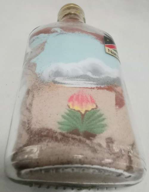 Beautiful artistic Namibian sand art bottle with aloe design
