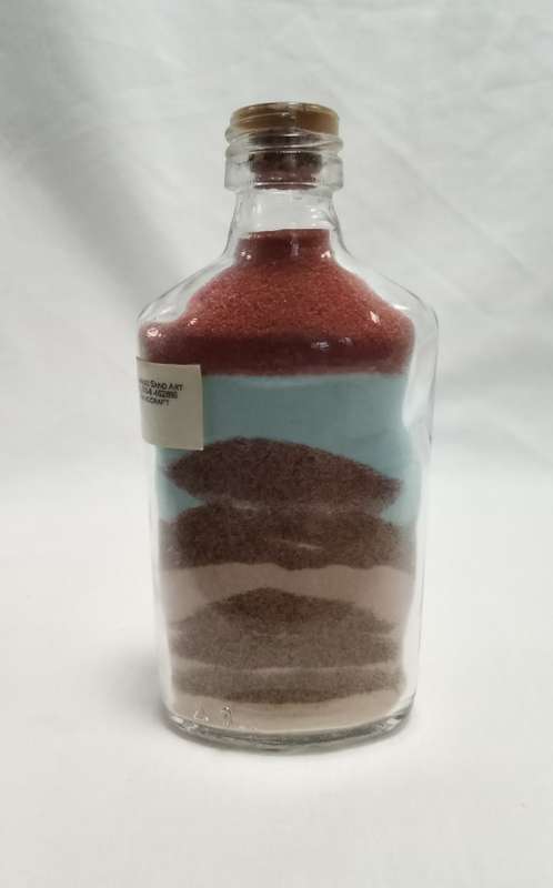 Beautiful artistic Namibian sand art bottle with aloe design
