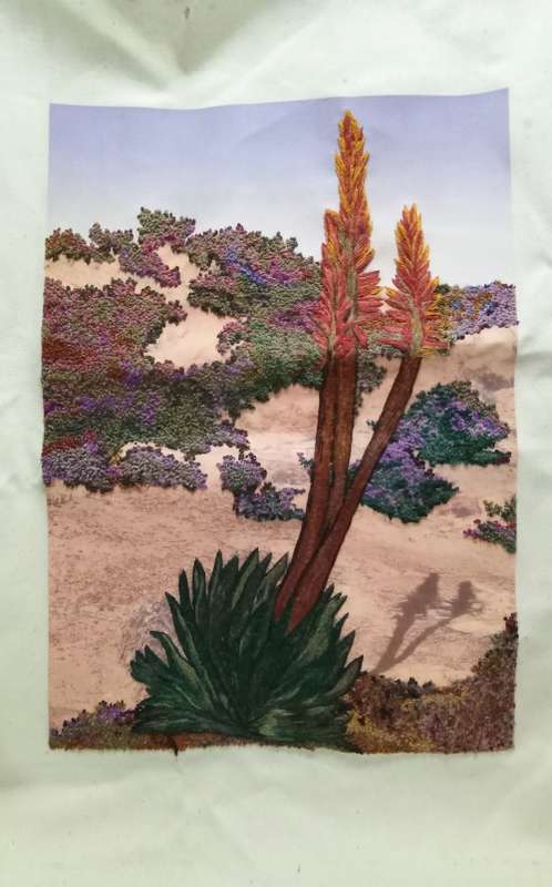 Exquisite hand embroidered landscape with Aloe