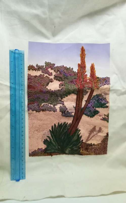 Exquisite hand embroidered landscape with Aloe