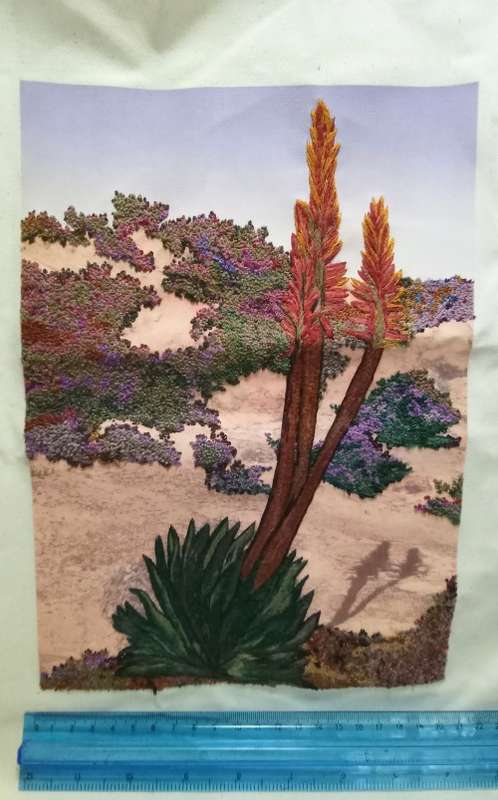Exquisite hand embroidered landscape with Aloe