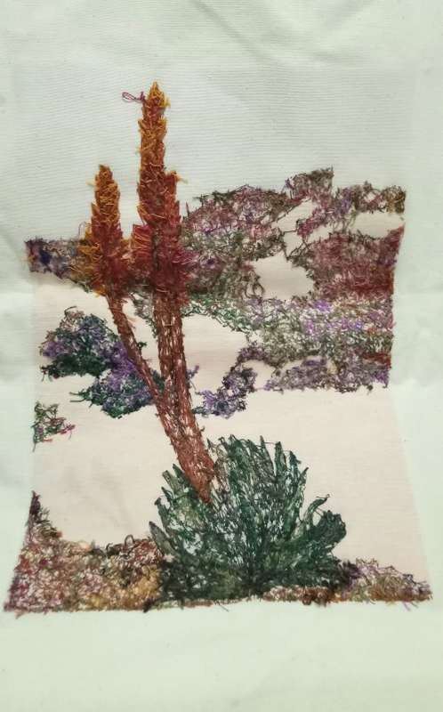 Exquisite hand embroidered landscape with Aloe